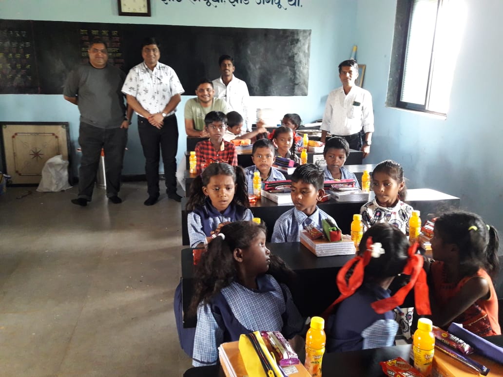 Empowering young minds: Providing essentials like books, pouches, mango juice, and biscuits to underprivileged students in government schools. Together, we